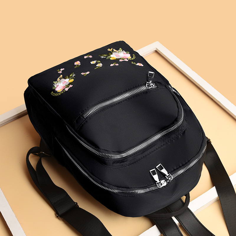 Kirjanduslik hiina stiilis naiste seljakott, lillemustriga vabaaja õpilaste koolikotid, kolmekihilised tõmblukuga nailonriidest naiste seljakotid