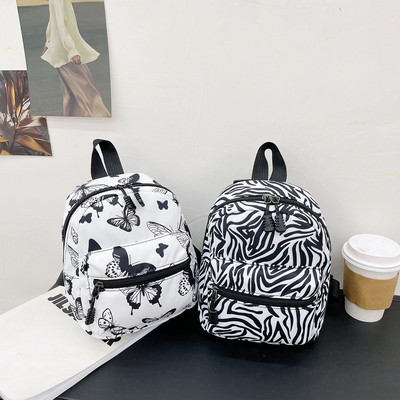 Mini novi modni ženski ruksak s printanim životinjskim uzorkom u elegantnom stilu Studentske školske torbe Ženske ležerne male torbice s naprtnjačama