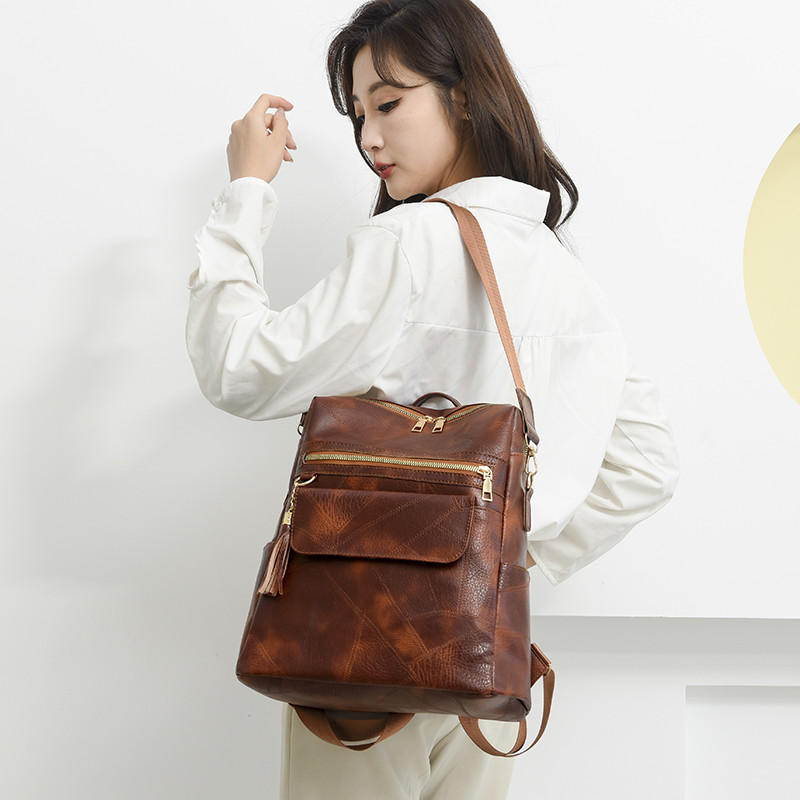 Kvaliteetsest nahast naiste vintage kott Koolikotid reisikott Naiste raamatukotid Naiste seljakott Suure mahutavusega seljakott rahakotid