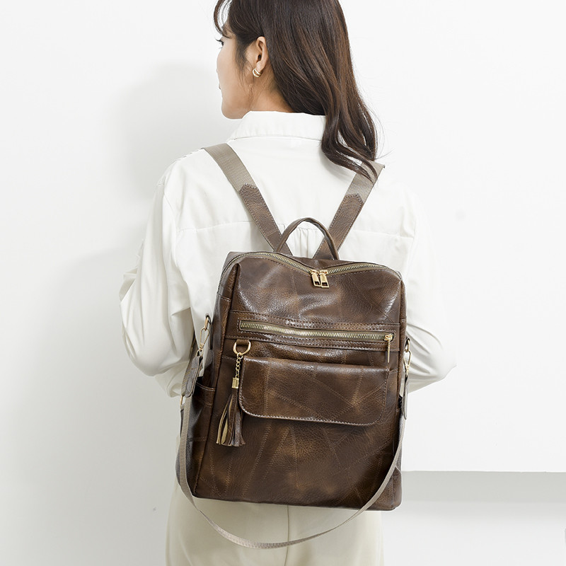 Kvaliteetsest nahast naiste vintage kott Koolikotid reisikott Naiste raamatukotid Naiste seljakott Suure mahutavusega seljakott rahakotid