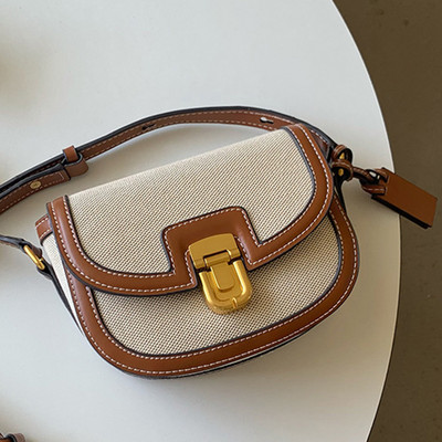 Dámska kožená sedlová taška s nastaviteľným popruhom, retro crossbody taška, všestranná vintage tote taška s kovovou sponou, dámska ležérna kabelka
