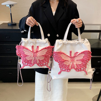 Τσάντα ώμου ρετρό καουμπόη τζιν γυναικεία τσάντα πλάτης 2023 Νέα γυναικεία κομψή σχεδίαση τσάντα με αλυσίδα πεταλούδας Γυναικεία πάνινη τσάντα τσάντα