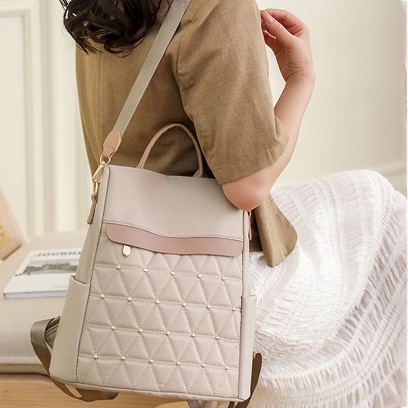 Naiste seljakott suure mahutavusega vabaaja reisikott Lihtne ühevärviline õlakott Kvaliteetne nailonist riidest kotikott Mochilas