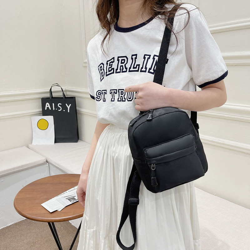 Mini naiste puhtast nailonist tõmblukuga seljakott, ühevärviline õpilaste kooli õlakott, reisikott naiste telefonikoti jaoks