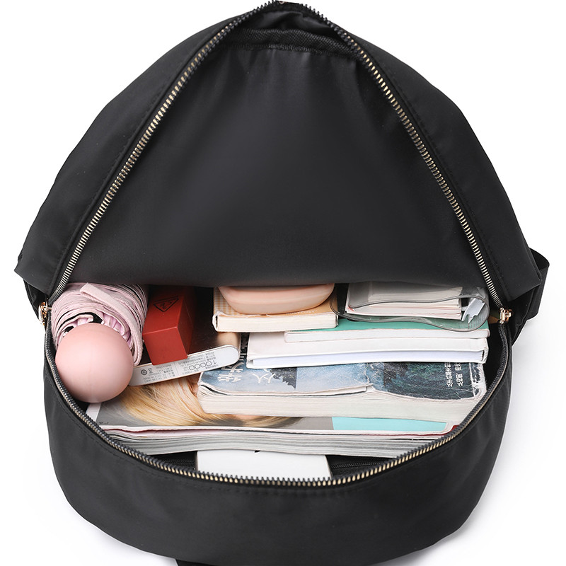Kiváló minőségű nylon vászon hátizsák Divattervező nagy kapacitású lány iskolatáska egyszínű szabadidős utazási hátizsákok 2023 Új