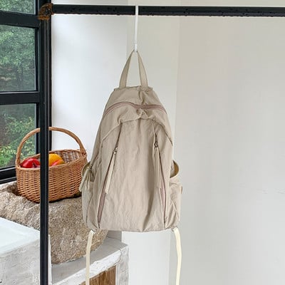 Korea naiste seljakott nailonist sülearvuti esteetiline seljakott õlakott Koolikotid teismelise üliõpilase seljakott Kausaalne reisikott