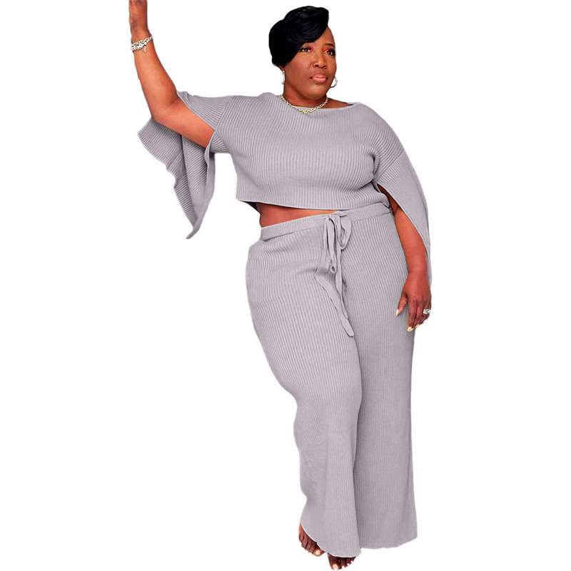 Uus suures suuruses naisteriiete kaheosaline komplekt vabaaja libisevate varrukatega, ribidega ülivenivad elegantsed pükstekomplektid, hulgimüük