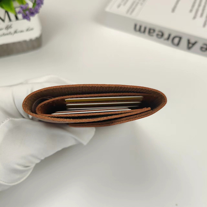 Lühike rahakott Naiste rahakott Mitme kaardiga multifunktsionaalne kaardihoidja Mündi rahakott Moodne Lihtne kolme volditav lühike klambriga naiste minirahakott