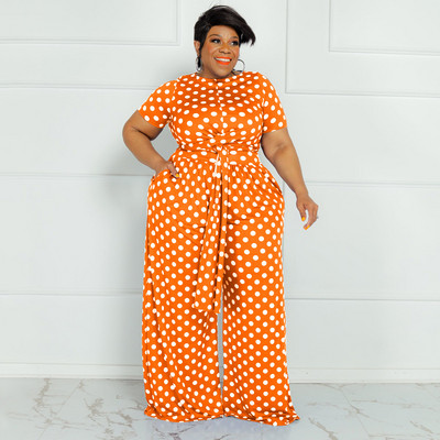 CM.YAYA Plus Size Elegantná bodkovaná dámska súprava s dvoma 2-dielnymi outfitmi, letným tričkom s kravatou a nohavicami so širokými nohavicami, fitness súprava