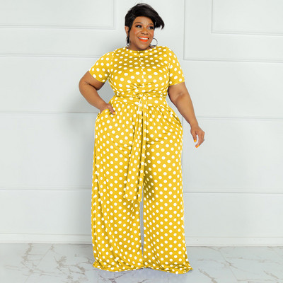 CM.YAYA Plus Size Elegantná bodkovaná dámska súprava s dvoma 2-dielnymi outfitmi, letným tričkom s kravatou a nohavicami so širokými nohavicami, fitness súprava