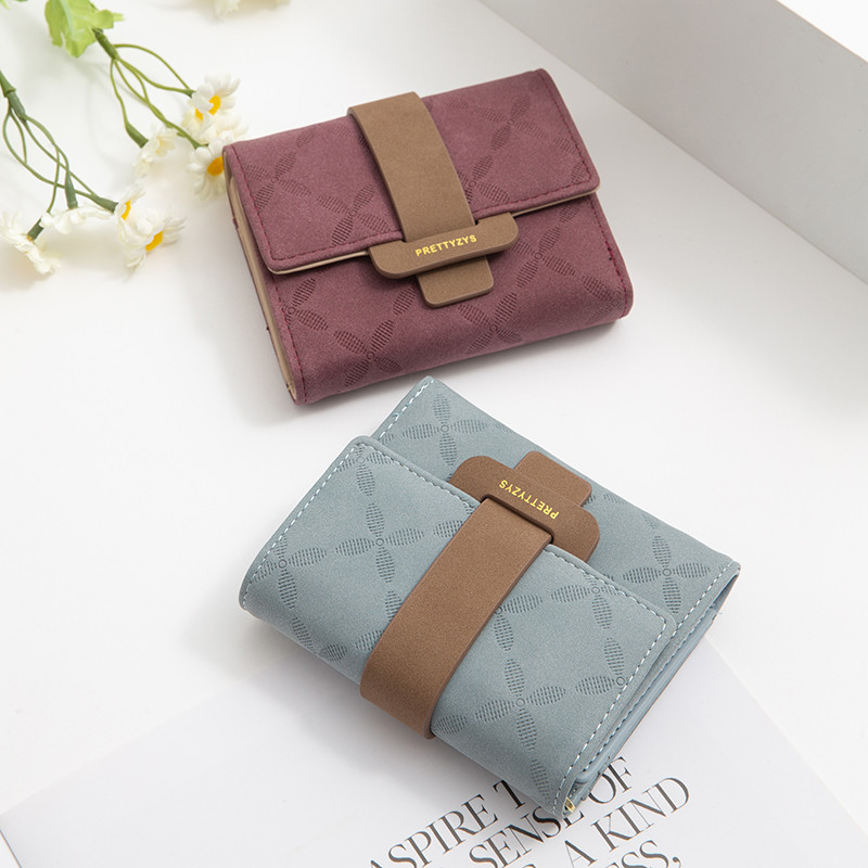Ανοιξιάτικο και Καλοκαίρι νέο γυναικείο κοντό πορτοφόλι Κορεάτικη έκδοση με εμπριμέ αγκράφα απλή, πτυσσόμενη, κοντό γυναικείο πορτοφόλι δερμάτινο PU