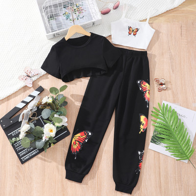 Tüdrukute suvemoodne kolmeosaline komplekt, mis on ühendatud lühikeste varrukatega T-särkide liblikarihmade ja pükste kolmeosalise komplektiga