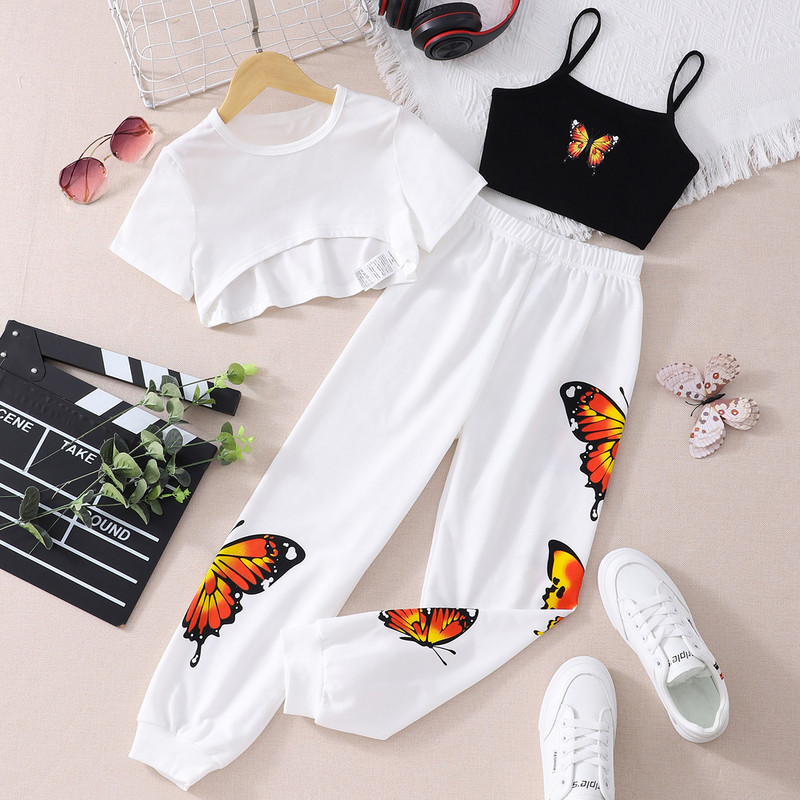 Tüdrukute suvemoodne kolmeosaline komplekt, mis on ühendatud lühikeste varrukatega T-särkide liblikarihmade ja pükste kolmeosalise komplektiga