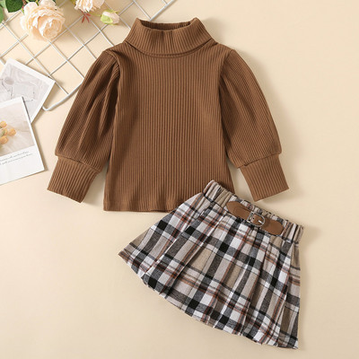 1–6-aastased moodsad väikelapsed tüdrukud, 2 tk. riidekomplektid, kõrge kaelusega pikkade varrukatega topp ja nahast nööbiga ruuduline seelik tüdrukutele 1–6T