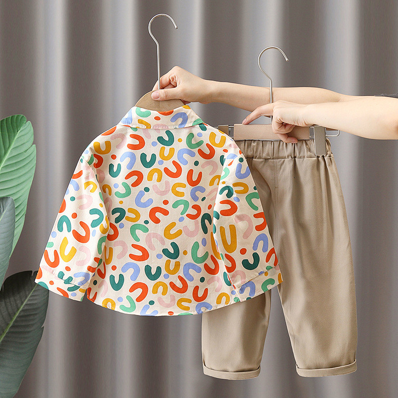 Βρεφικά ρούχα φθινοπωρινά αγόρια Βρεφικά κινούμενα σχέδια δεινόσαυρος μακρυμάνικο πουκάμισο και παντελόνι συνονθύλευμα παιδικό κολάρο με γυριστό κάτω Κοστούμι παντελόνι Cargo