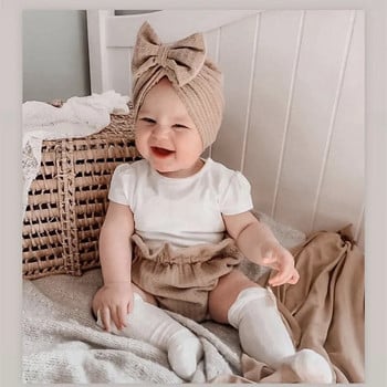 Υπέροχο πλεκτό μωρό καπέλο με παπιγιόν Χαριτωμένο μονόχρωμο μωρό κορίτσια για αγόρια Καπέλο τουρμπάνι Μαλακό νεογέννητο καπέλο για βρέφη Πλέξιμο με φασόλια κεφαλές