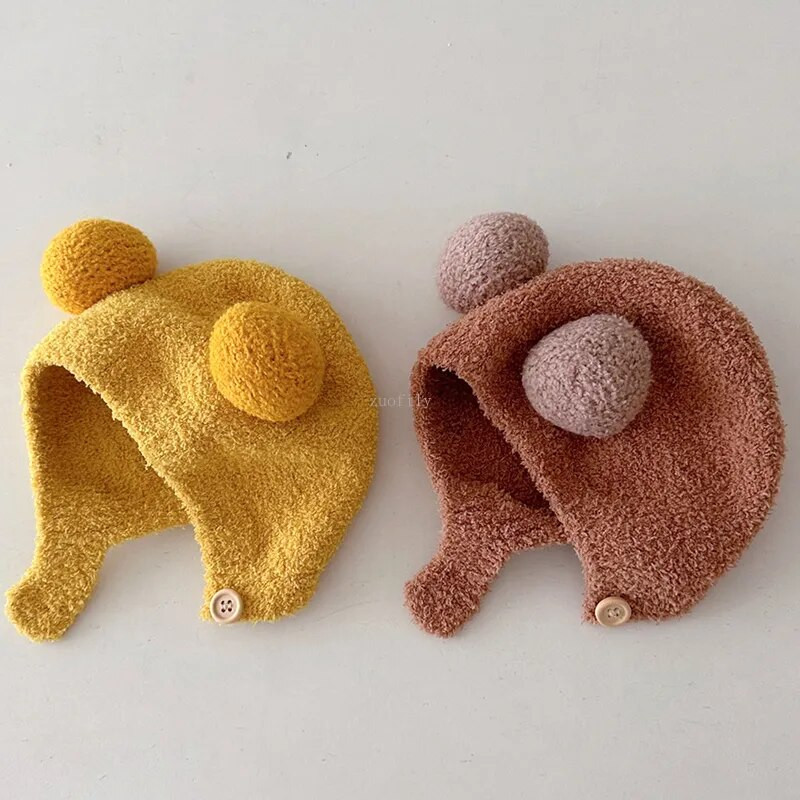 Χαριτωμένα χειμωνιάτικα ζεστά παιδικά κορίτσια Αγόρια Καπέλα μωρού Fleece μαλλί καπέλα στριφώματος με μπάλα μασίφ μαλλί προστατευτικά καπέλα αυτιών Μαλακό καπό νεογέννητου