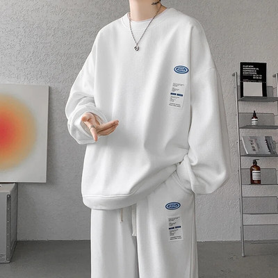 Μοντέρνο ανδρικό αθλητικό σετ άνοιξης και φθινοπώρου 2023 Μακρυμάνικο πουλόβερ Patch Μεγάλο casual παντελόνι Σετ δύο τεμαχίων