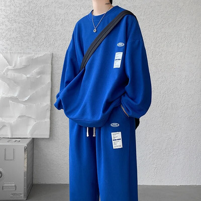 Μοντέρνο ανδρικό αθλητικό σετ άνοιξης και φθινοπώρου 2023 Μακρυμάνικο πουλόβερ Patch Μεγάλο casual παντελόνι Σετ δύο τεμαχίων