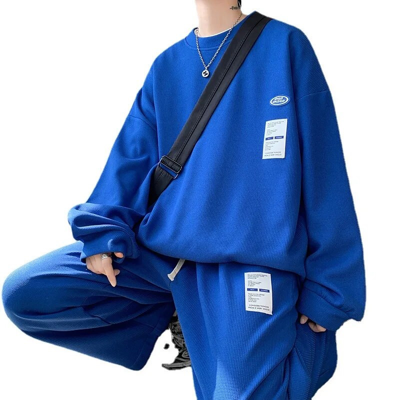 Μοντέρνο ανδρικό αθλητικό σετ άνοιξης και φθινοπώρου 2023 Μακρυμάνικο πουλόβερ Patch Μεγάλο casual παντελόνι Σετ δύο τεμαχίων