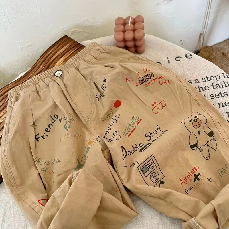 Nyári új gyerekek lányok divatos graffiti nadrágok aranyos medve mintás nadrág fiúknak hárem nadrág pamut kiváló minőségű melegítőnadrág