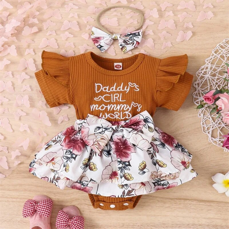 Csecsemő újszülött kislány nyári nadrágtartó rövid ujjú, kerek nyakú masnival elöl Patchwork szoknya Body