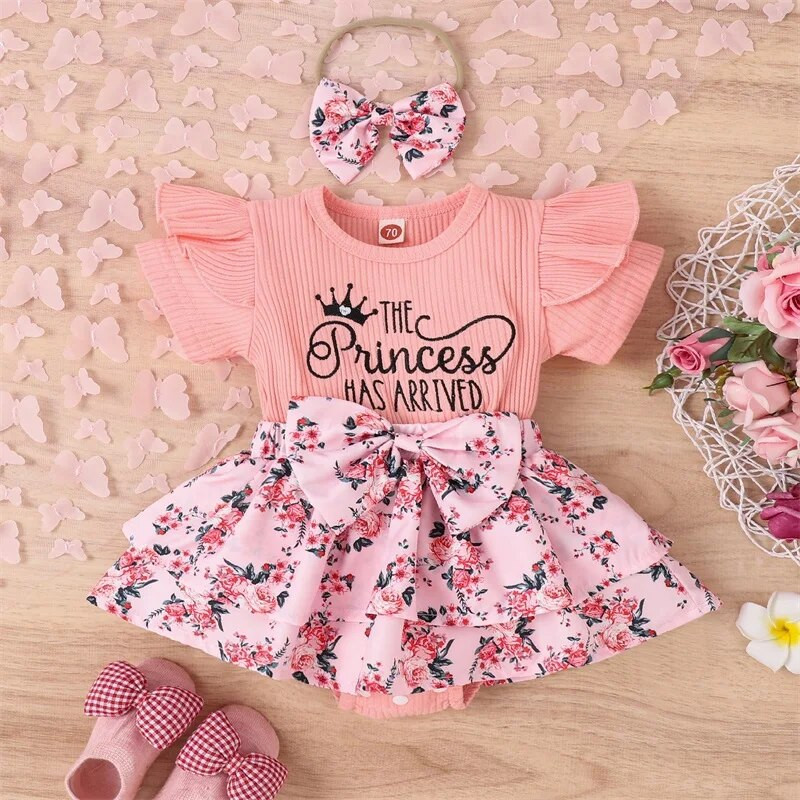 Csecsemő újszülött kislány nyári nadrágtartó rövid ujjú, kerek nyakú masnival elöl Patchwork szoknya Body