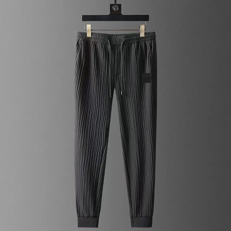 Nyári új bő kétrészes szett férfi rövid ujjú póló húzózsinóros nadrág koreai ráncos sport alkalmi öltöny trend férfi ruhák