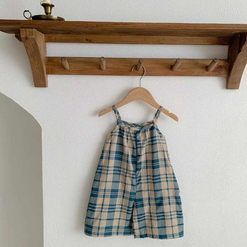 Nyári kockás jumpsuit gyerekeknek divatos bő sling nadrág fiúknak vékony, légáteresztő nadrág lányoknak pamut egyszerű nadrág egynemű