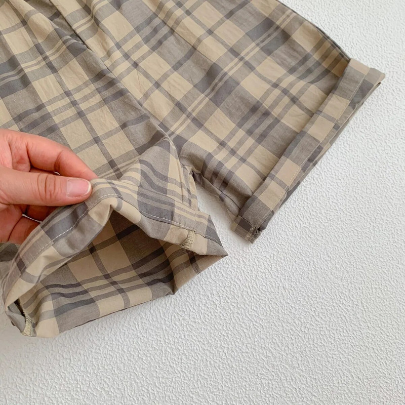 Nyári kockás jumpsuit gyerekeknek divatos bő sling nadrág fiúknak vékony, légáteresztő nadrág lányoknak pamut egyszerű nadrág egynemű