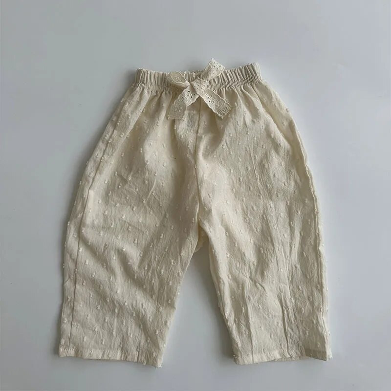 Tavasz és nyár lány csipkedekorációs masnis nadrágok baba bő virágos alkalmi nadrágok tipegő strapabíró sokoldalú vékony nadrágok lányoknak