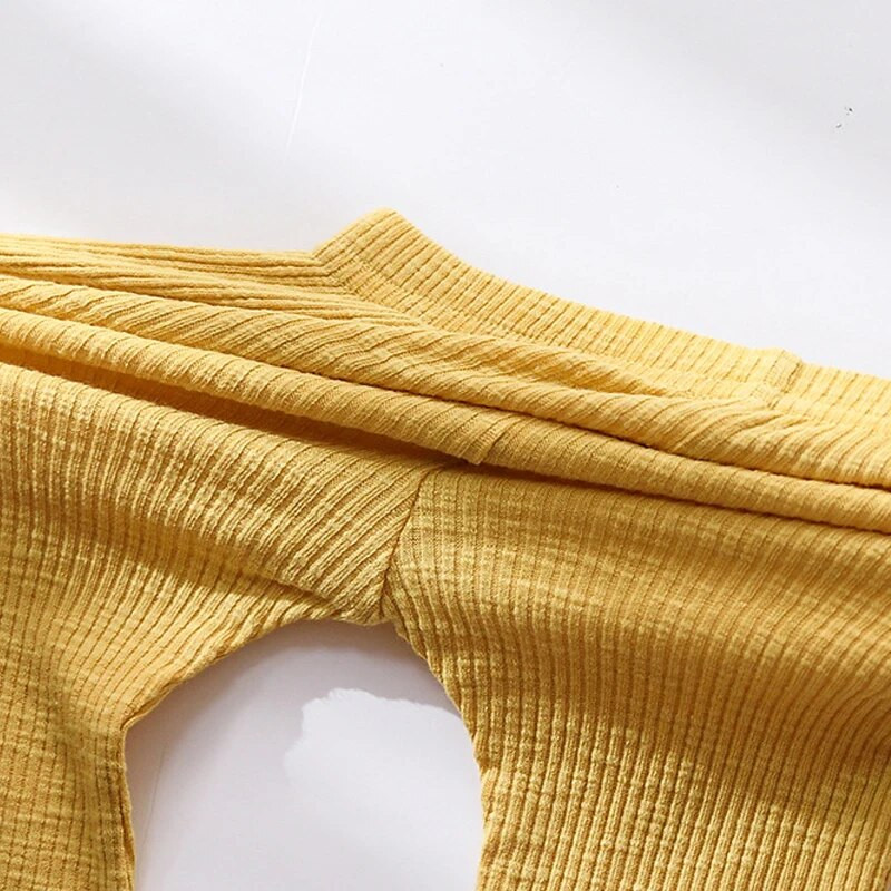 Baba csengő alsó 2022 új őszi gyerekruhák csecsemők cukorka színű rugalmas kiszélesedő nadrágok újszülött alkalmi bő pamut nadrágok