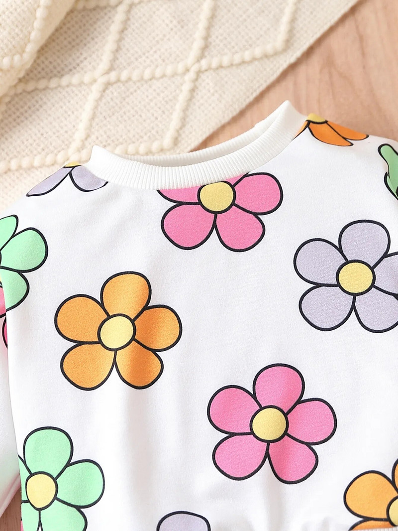 Īpaši piemīlīgs ziedu raksts ar 2 daļīgām piedurknēm mazuļiem + modes bikses ar zvaniņu, ērts rudens un ziemas izbraukuma apģērbs