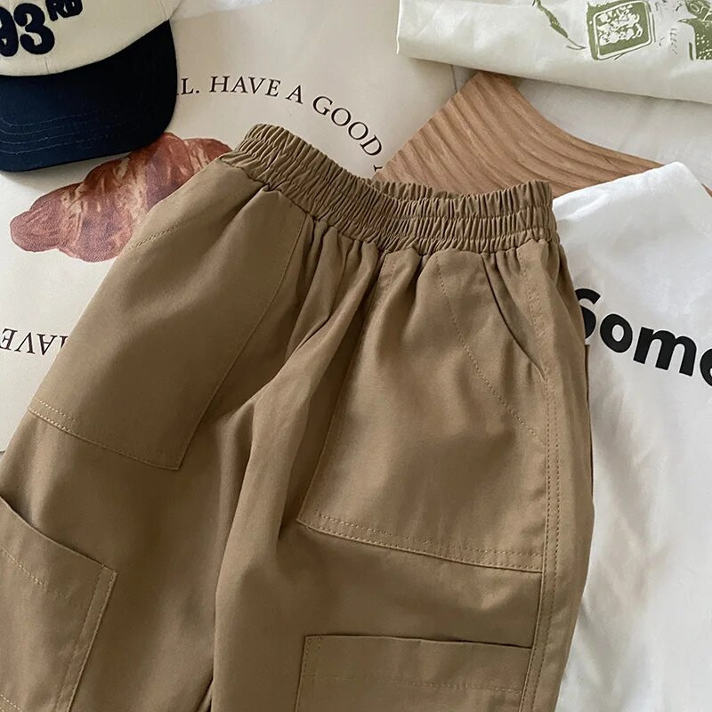 Bērnu Boy Cargo Bikses 1-7 Gads Toddler Kids Vienkrāsains elastīgs viduklis kabatas bikses Apģērbi brīvi apakšā Korejas stila apģērbi