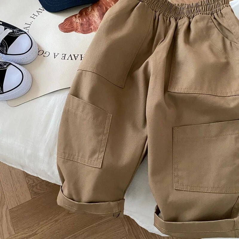 Bērnu Boy Cargo Bikses 1-7 Gads Toddler Kids Vienkrāsains elastīgs viduklis kabatas bikses Apģērbi brīvi apakšā Korejas stila apģērbi