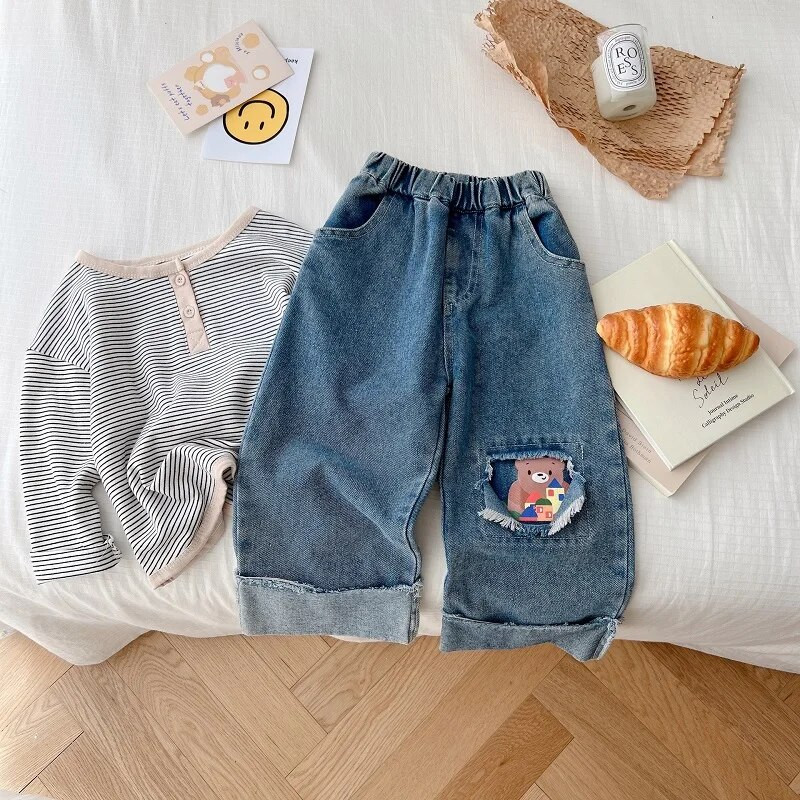 Modes Bērnu meiteņu džinsi 1–7 gadi Maziem bērniem elastīga vidukļa multfilma Lācis saplēsts džinsa bikses platas bikses rudens drēbes