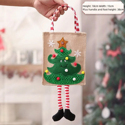 Ziemassvētku radoši dāvanu maisiņi ar sarkanām baltām svītrām kājām Ziemassvētku vecītis Sniegavīrs Alnis ābolu maisiņi Priecīgus Ziemassvētkus Bērnu konfektes rokassomas