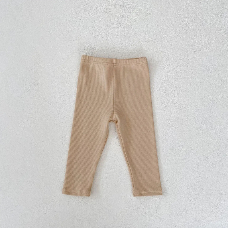Μωρό μονόχρωμο κολάν 2023 Φθινόπωρο Βρεφικά αγόρια Κοριτσίστικα κολάν με ραβδώσεις στενό παντελόνι 0-3 ετών Βρεφικό νήπιο Παιδικό καθημερινό παντελόνι