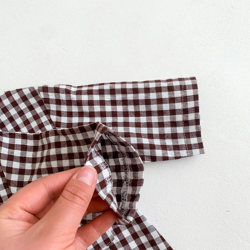 2023 Nove široke štrample Odjeća za dječake i djevojčice Karirani pamučni ležerni kombinezon s dugim rukavima Korejska odjeća za dojenčad Jednodijelni