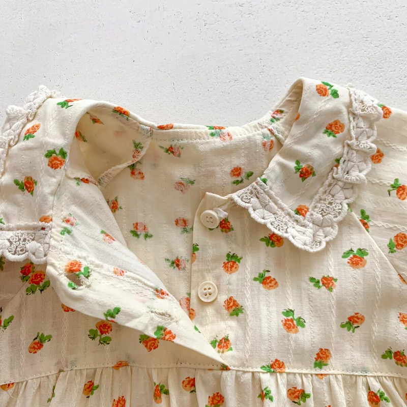 Mazuļu vasaras drēbes jaundzimušo bērnu bodijs meitenēm ar īsām piedurknēm ziedu viengabala mežģīnes Pētera Pena apkakles zīdaiņu toddler meiteņu kombinezons