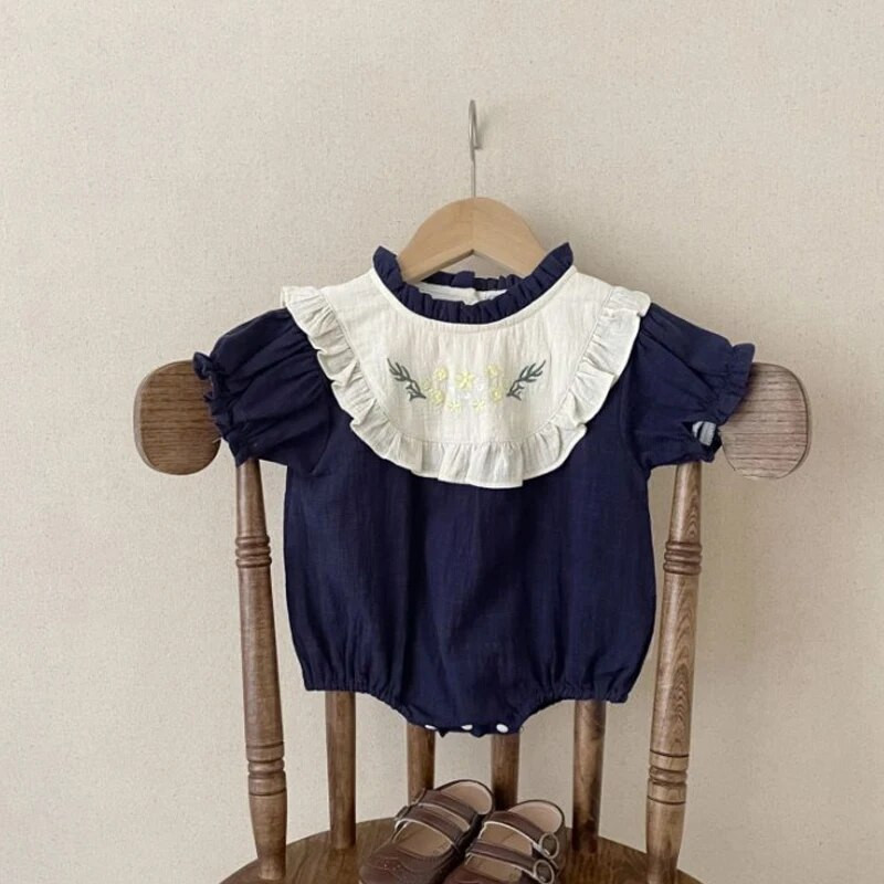 Mazuļu vasaras drēbītes meitenēm Zīdaiņu puķu izšuvumi Bodiji ar īsām piedurknēm Džumots kokvilnas volānveida apkakle, toddler raibs krekliņš