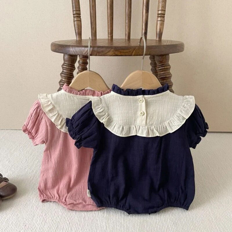 Mazuļu vasaras drēbītes meitenēm Zīdaiņu puķu izšuvumi Bodiji ar īsām piedurknēm Džumots kokvilnas volānveida apkakle, toddler raibs krekliņš