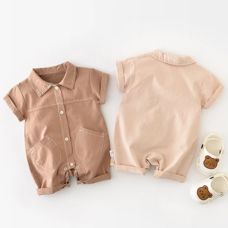Mazuļu drēbes zēnu 2023. gada vasaras modes kombinezoni zīdaiņiem vienkrāsains, vienkāršs mazuļu zēnu kokvilnas kombinezons ar īsām piedurknēm