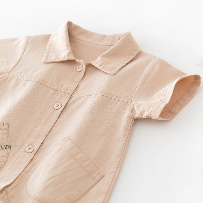 Mazuļu drēbes zēnu 2023. gada vasaras modes kombinezoni zīdaiņiem vienkrāsains, vienkāršs mazuļu zēnu kokvilnas kombinezons ar īsām piedurknēm