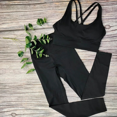 Modes sporta zāles komplekti Active Wear Sieviešu pelēks Jogas komplekts Elpojošs Sieviešu treniņu 2 daļīgs komplekts Sieviešu sporta tērpi Apģērbu vairumtirdzniecība