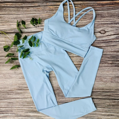 Modes sporta zāles komplekti Active Wear Sieviešu pelēks Jogas komplekts Elpojošs Sieviešu treniņu 2 daļīgs komplekts Sieviešu sporta tērpi Apģērbu vairumtirdzniecība