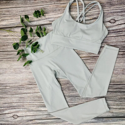 Modes sporta zāles komplekti Active Wear Sieviešu pelēks Jogas komplekts Elpojošs Sieviešu treniņu 2 daļīgs komplekts Sieviešu sporta tērpi Apģērbu vairumtirdzniecība