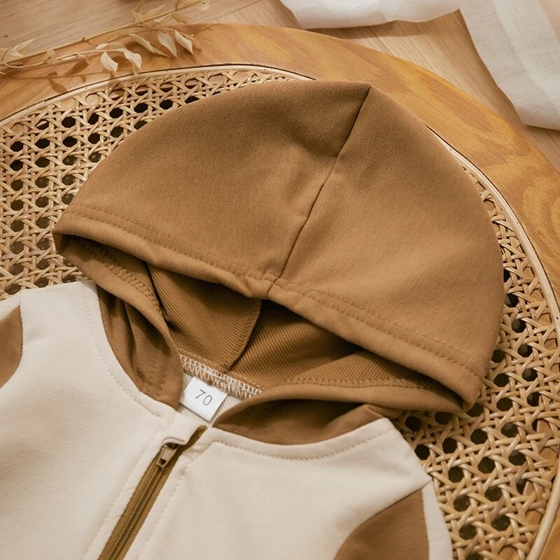 Zīdaiņu, meiteņu, zēnu, rudens, ziemas bērnu drēbes, pilna garuma kombinezons, kontrastējošas krāsas kapuci, kombinezons ar rāvējslēdzēju