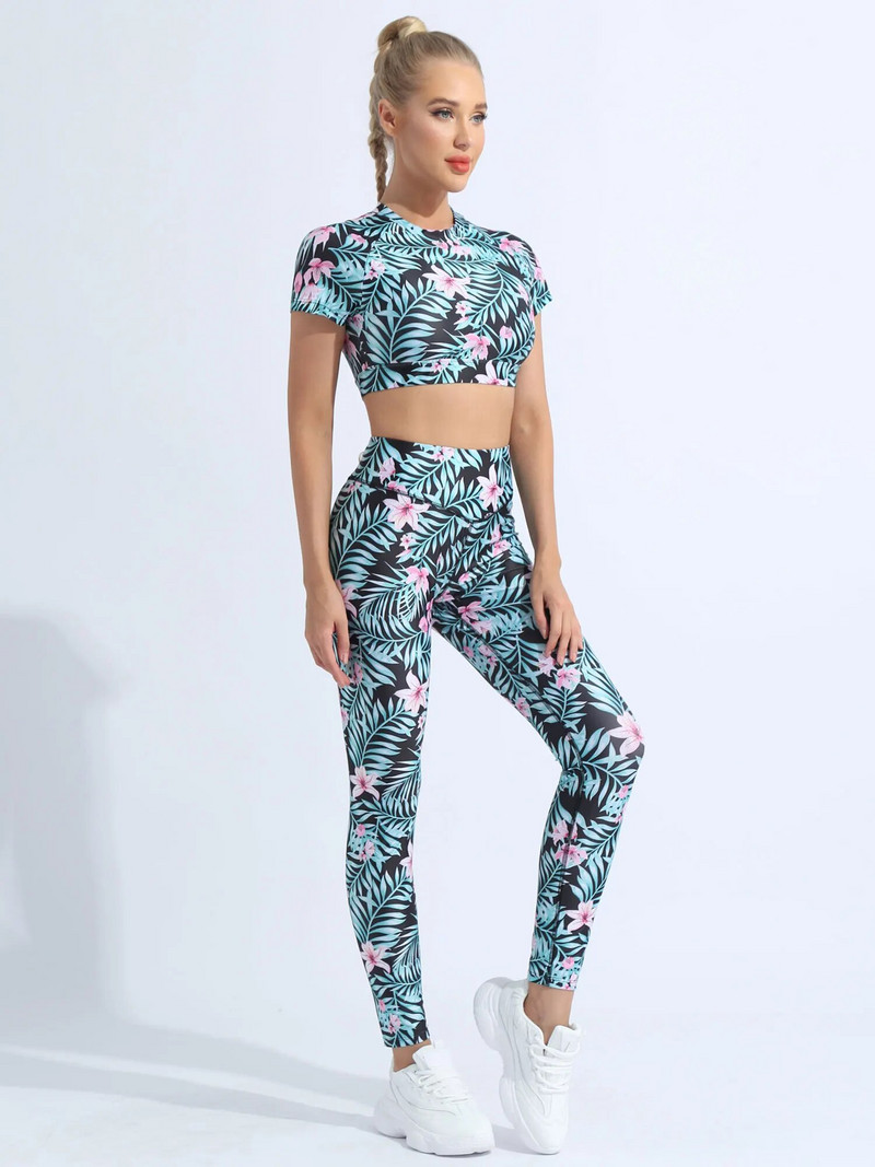 2Gb Sieviešu vasaras apdrukāts sporta jogas uzvalks ar apaļu kakla izgriezumu, īsām piedurknēm atslēgas caurums aizmugurē, apgriezts augšējais T-krekls ar legingiem, bikšu komplekts