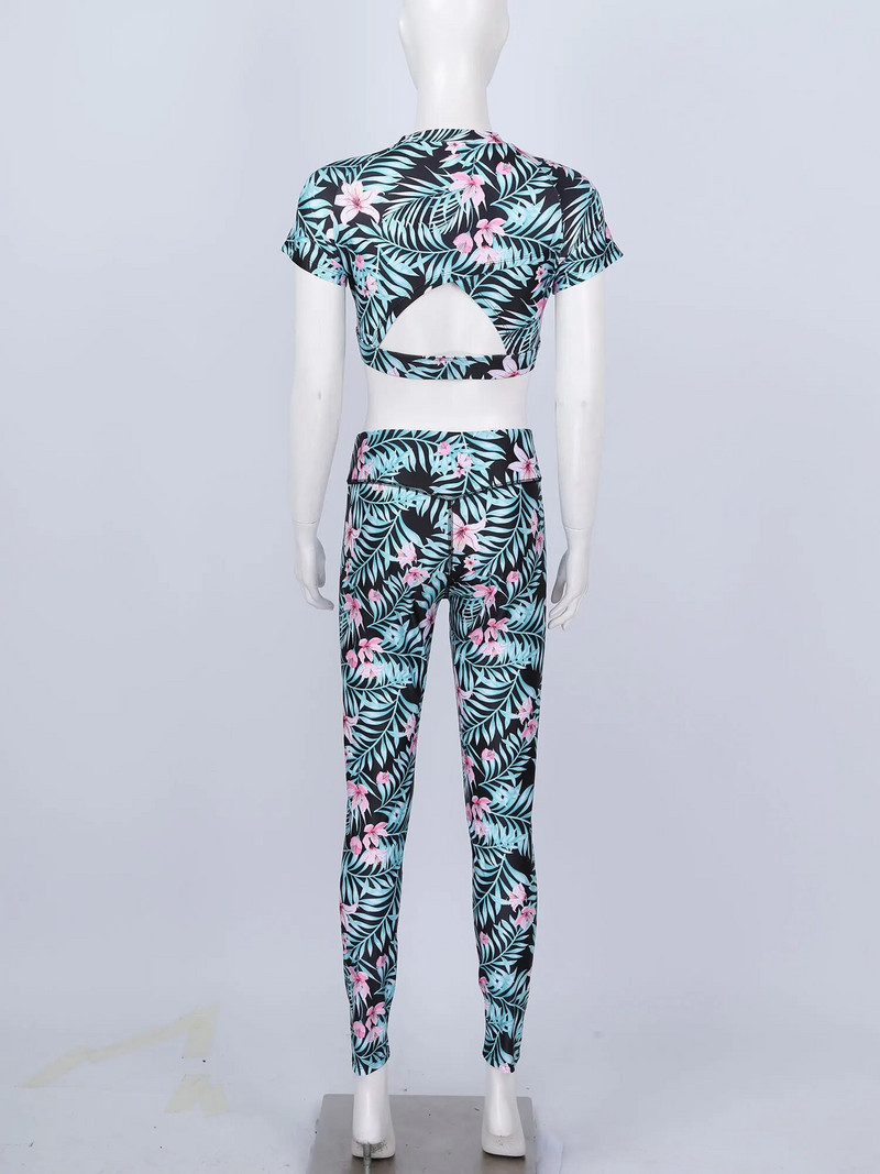 2Gb Sieviešu vasaras apdrukāts sporta jogas uzvalks ar apaļu kakla izgriezumu, īsām piedurknēm atslēgas caurums aizmugurē, apgriezts augšējais T-krekls ar legingiem, bikšu komplekts